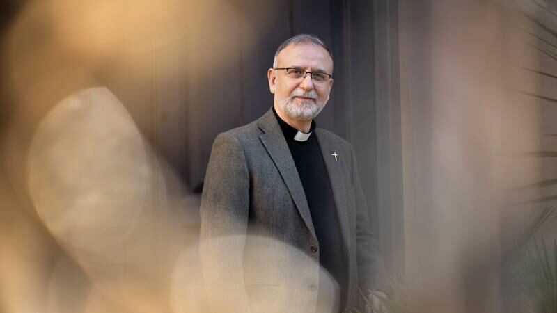 An image that illustrates this article Leading light: Father Nadim Nassar crosses the divides