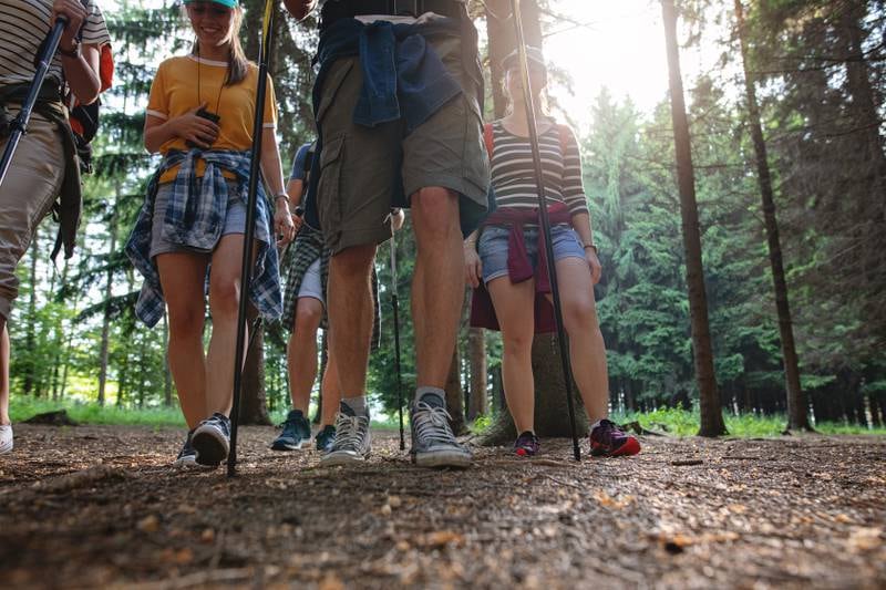 Hike with a group of friends or family. Getty Images