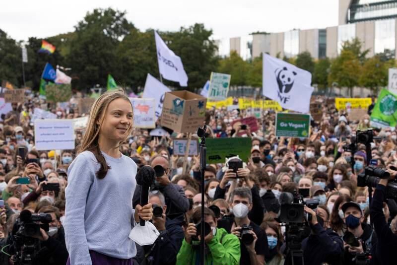 Greta Thunberg on stage during a Fridays for Future march in front of the Reichstag in Berlin, Germany, in September 2021.