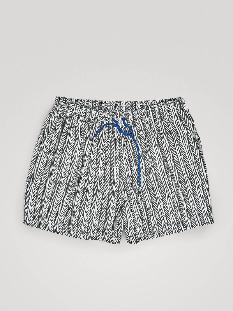 Massimo Dutti shorts, Dh199: A beautiful herringbone print emblazoned all over quality technical fabric. The royal blue drawstrings are a great detail. Trust the Spanish label for reasonably priced tailoring