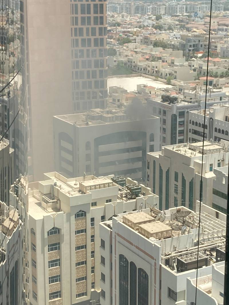 Smoke rises from the roof of a building in Khalidiya. Police said a gas cylinder had exploded. The National