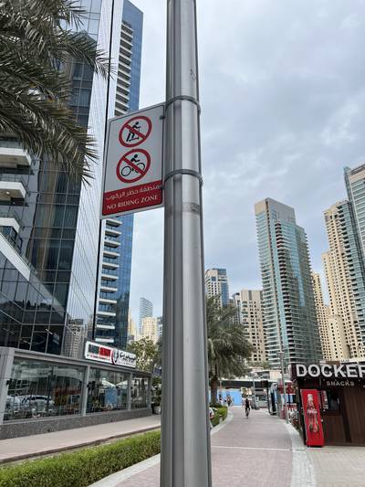 In this roughly 500 metre section from Marina Mall to the yacht wharf it is prohibited to cycle or use an e-scooter. Rory Reynolds / The National
