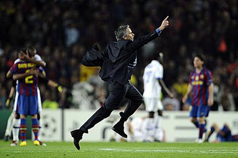 Jose Mourinho celebrates at the final whistle in the Camp Nou after Inter secure their passage to the Champions League final.