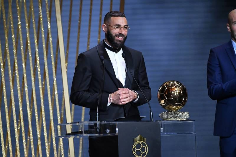 Real Madrid and France striker Karim Benzema receives the Ballon d'Or award during the Ballon d'Or ceremony at Theatre Du Chatelet in Paris on October 17, 2022 in Paris. Getty Images