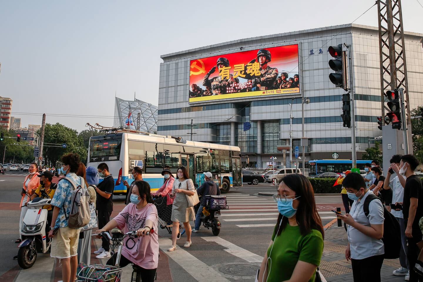 A billboard in Beijing marks the 95th anniversary of the founding of the People's Liberation Army (PLA). EPA