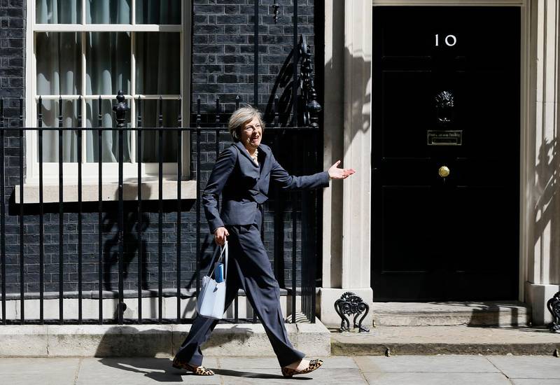 Mrs May, then Home Secretary, with a spring in her step after attending a cabinet meeting in London on Junly 12, 2016. AP