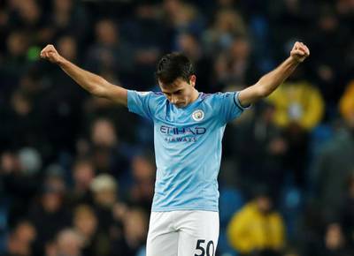FILE PHOTO: Soccer Football - Premier League - Manchester City v Sheffield United - Etihad Stadium, Manchester, Britain - December 29, 2019   Manchester City's Eric Garcia celebrates after the match   Action Images via Reuters/Andrew Boyers    EDITORIAL USE ONLY. No use with unauthorized audio, video, data, fixture lists, club/league logos or "live" services. Online in-match use limited to 75 images, no video emulation. No use in betting, games or single club/league/player publications.  Please contact your account representative for further details./File Photo