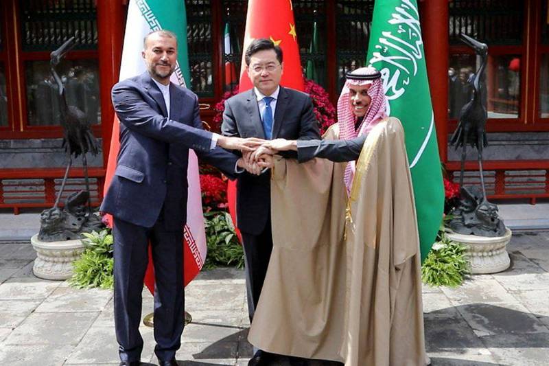 Iran's Foreign Minister Hossein Amirabdollahian with Saudi Foreign Affairs Minister Prince Faisal bin Farhan and Chinese Foreign Minister Qin Gang in Beijing. AFP
