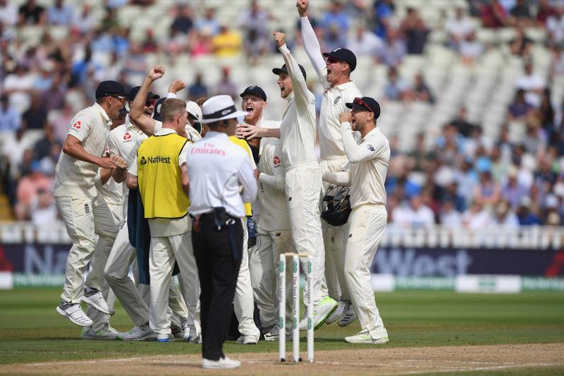 BIRMINGHAM, ENGLAND - AUGUST 04:  England captain Joe Root (3rd r) and players celebrate the review decision for the wicket of Ishant Sharma during day 4 of the First Specsavers Test Match between England and India at Edgbaston on August 4, 2018 in Birmingham, England.  (Photo by Stu Forster/Getty Images)