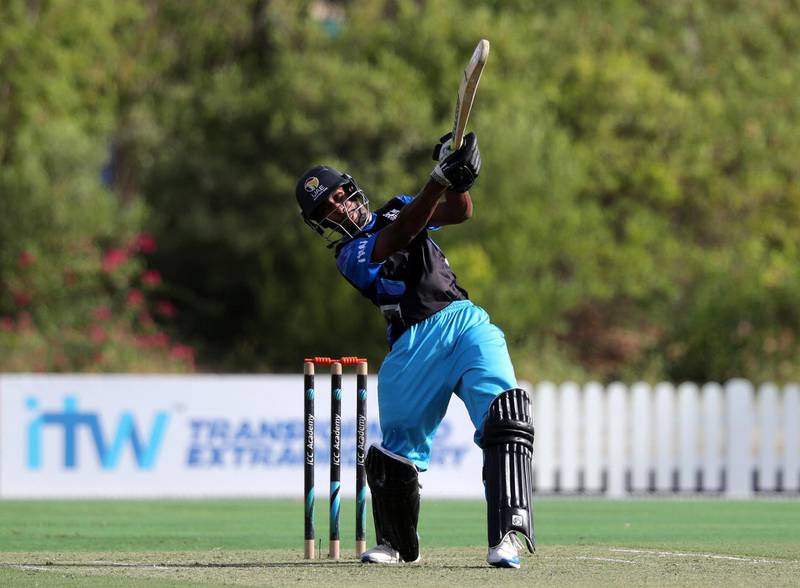 Dubai, United Arab Emirates - Reporter: N/A. Sport. Cricket. ECB Blues' Vriitya Aravind hits a six during the match between the ECB Blues and Dubai in the Emirates D10. Friday, July 24th, 2020. Dubai. Chris Whiteoak / The National