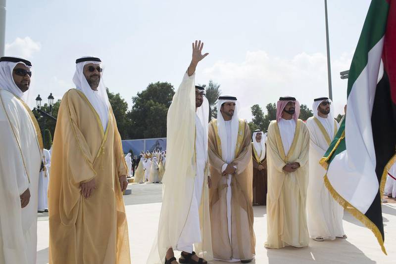 From left to right Sheikh Mohammed bin Hamad Al Sharqi, Crown Prince of Fujairah, Sheikh Sultan bin Mohammed Al Qasimi, Crown Prince of Sharjah, General Sheikh Mohammed bin Zayed, Crown Prince of Abu Dhabi and Deputy Supreme Commander of the UAE Armed Forces, Sheikh Abdullah bin Zayed, Minister of Foreign Affairs, Sheikh Hamdan bin Mohammed, Crown Prince of Dubai, Sheikh Ammar bin Humaid Al Nuaimi, Crown Prince of Ajman and Sheikh Rashid bin Saud bin Rashid Al Mualla, Crown Prince of Umm Al Quwain attend the flag raising ceremony in celebration of the UAEís 43rd National Day, at the Breakwater in Abu Dhabi. Ryan Carter / Crown Prince Court - Abu Dhabi 