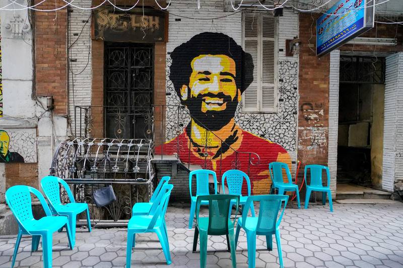 June 12, 2018- Cairo, Egypt. A mural of star footballer Mohamed Salah is painted on an alleyway in downtown Cairo. Egypt will play in the World Cup for the first time in 28 years. (Dana Smillie for The National)