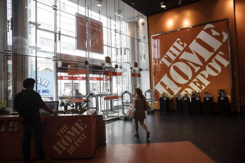 A customer exits a Home Depot Inc. store in New York, U.S., on Friday, Aug. 11, 2017. Home Depot Inc. is scheduled to release earnings figures on August 15. Photographer: Victor J. Blue/Bloomberg