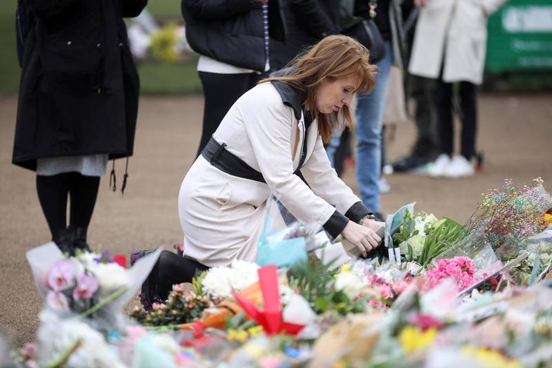 Labour MP Angela Rayner lays flowers at a memorial site at the Clapham Common Bandstand, following the kidnap and murder of Sarah Everard, in London, Britain March 16, 2021. REUTERS/Hannah McKay