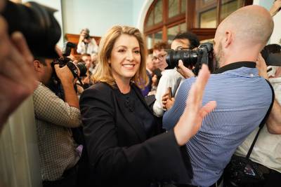 Ms Mordaunt arrives for the launch of her Conservative leadership campaign at the Cinnamon Club in Westminster. PA