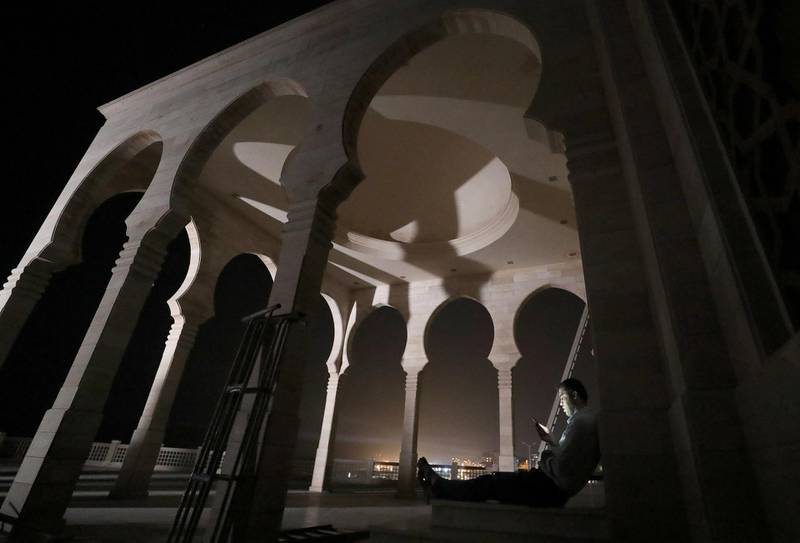 A Palestinian reads outside a mosque in the northern Gaza Strip. Reuters