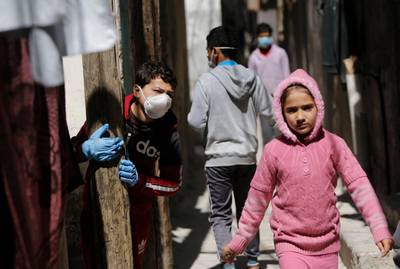 Palestinian children play at the al-Shati refugee camp in Gaza City amid the coronavirus pandemic.  AFP