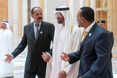 ABU DHABI, UNITED ARAB EMIRATES - July 24, 2018: HH Sheikh Mohamed bin Zayed Al Nahyan Crown Prince of Abu Dhabi Deputy Supreme Commander of the UAE Armed Forces (C), receives HE Dr Abiy Ahmed, Prime Minister of Ethiopia (R) and HE Isaias Afwerki, President of Eritrea (L), at the Presidential Palace. 

( Eissa Al Hammadi for Crown Prince Court - Abu Dhabi )
---