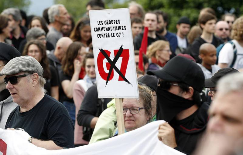 Protestors wait to march in Quebec City, Quebec, ahead of the G7 leaders' summit. AFP / Lars Hagberg