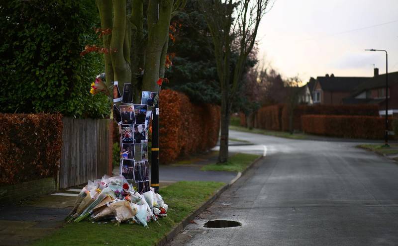 Floral tributes and photographs are left at the spot where 17-year-old Yousef Makki was stabbed to death, in Hale Barns, Britain, March 8, 2019. Makki was stabbed to death on March 2, 2019 during a row with another boy. A 17-year-old boy was cleared of his murder by a jury at Manchester Crown Court on July 12. Makki's family have protested against the verdict. REUTERS/Phil Noble   SEARCH "ATTACKS SHRINES" FOR THIS STORY. SEARCH "WIDER IMAGE" FOR ALL STORIES.