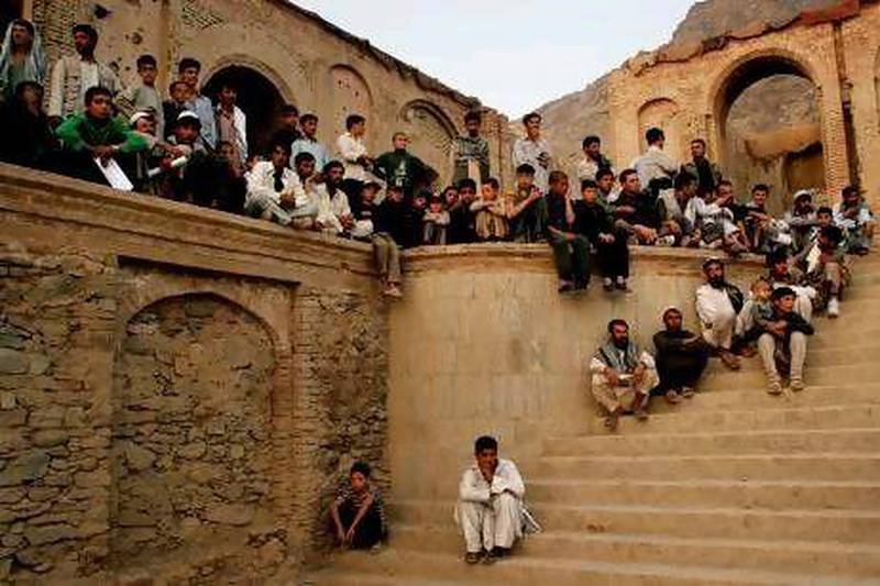 Afghans watch a performance of William Shakespeare's play Love's Labour's Lost in Kabul's Babur Garden in September 2005. AP Photo / Tomas Munita