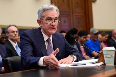 FILE PHOTO: Federal Reserve Chairman Jerome Powell testifies during a House Financial Services Committee hearing on "Monetary Policy and the State of the Economy" in Washington, U.S. July 10, 2019. REUTERS/Erin Scott/File Photo