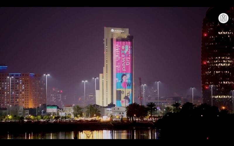 Mubadala Tower in Abu Dhabi lit up to celebrate Emirati children.