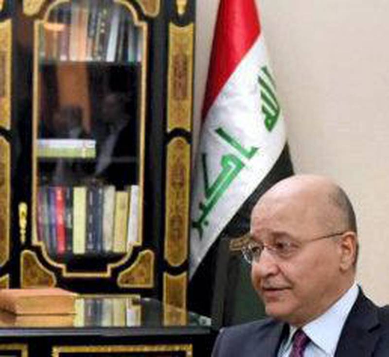 This handout photograph released by the Iraqi President's Office on February 1, 2020 shows President Barham Salih (R) presenting Mohammad Allawi, a former communications minister and lawmaker, with the decree to appoint him as Iraq's new premier. Iraq's president named former communications minister Mohammad Allawi as the country's new prime minister after an 11th-hour consensus among political blocs, but the streets seemed divided on his nomination. - === RESTRICTED TO EDITORIAL USE - MANDATORY CREDIT "AFP PHOTO / HO / IRAQI PRESIDENT'S PRESS OFFICE" - NO MARKETING NO ADVERTISING CAMPAIGNS - DISTRIBUTED AS A SERVICE TO CLIENTS === / AFP / Iraqi Presidency Media Office / - / === RESTRICTED TO EDITORIAL USE - MANDATORY CREDIT "AFP PHOTO / HO / IRAQI PRESIDENT'S PRESS OFFICE" - NO MARKETING NO ADVERTISING CAMPAIGNS - DISTRIBUTED AS A SERVICE TO CLIENTS ===