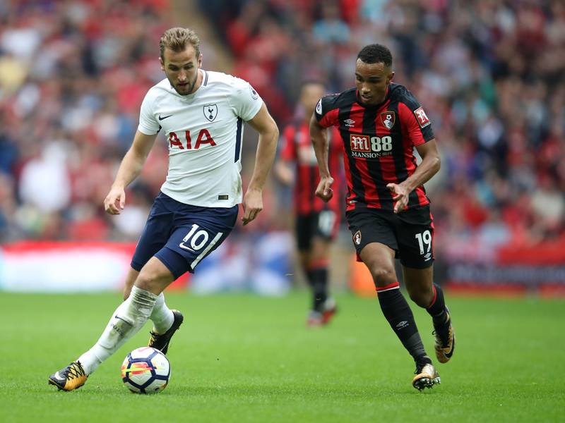 LONDON, ENGLAND - OCTOBER 14:  Junior Stanislas of Bournemouth battles with Harry Kane of Spurs during the Premier League match between Tottenham Hotspur and AFC Bournemouth at Wembley Stadium on October 14, 2017 in London, England.  (Photo by Julian Finney/Getty Images)