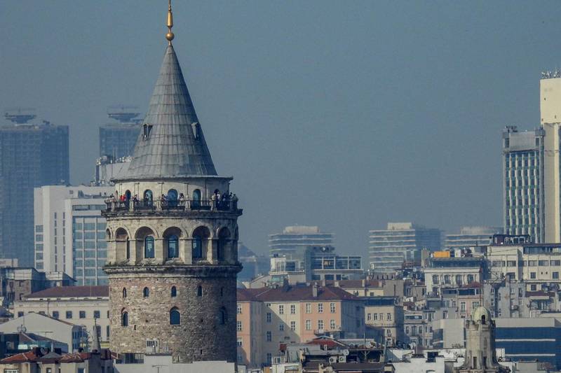 Tourists visit top of the Galata tower in Istanbul. AFP