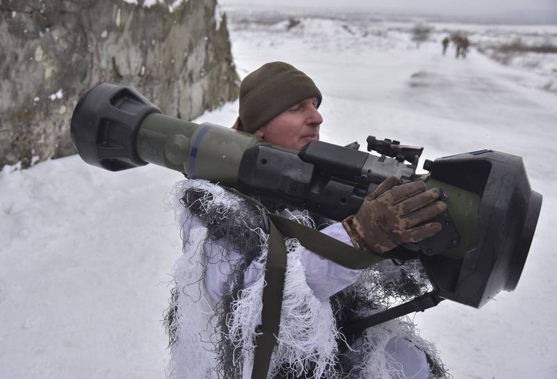 A Ukrainian soldier takes part in an exercise using NLAW anti-aircraft missiles close to the city of Lviv. The UK has delivered 2,000 NLAWs to Ukraine. AP