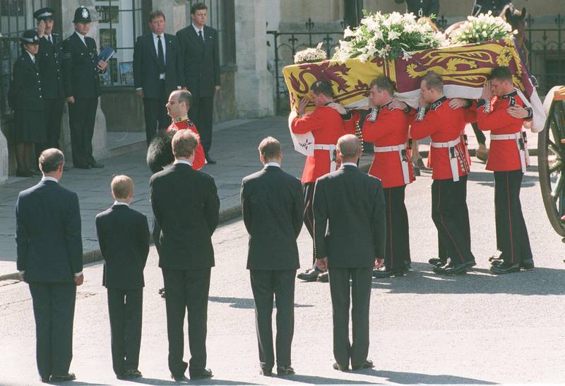 Prince Charles, Prince Harry, Earl Spencer, and Prince William watch as the coffin of Princess Diana is carried into Westminster Abbey, London, in September 1997. AFP