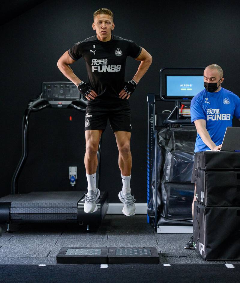 NEWCASTLE UPON TYNE, ENGLAND - APRIL 09: Dwight Gayle jumps on the pressure plates during the Newcastle United Training Session at the Newcastle United Training Centre  on April 09, 2021 in Newcastle upon Tyne, England. (Photo by Serena Taylor/Newcastle United via Getty Images)