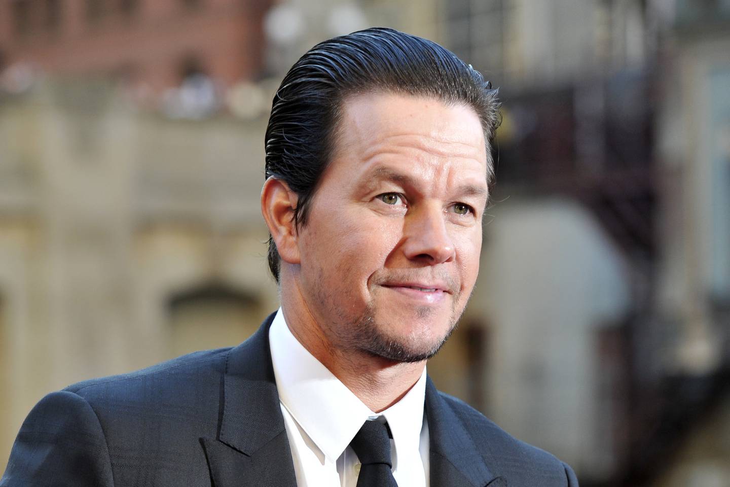FILE - In this Tuesday, June 20, 2017 file photo,Mark Wahlberg attends the U.S. premiere of "Transformers: The Last Knight" at the Civic Opera House on in Chicago. Wahlberg outmuscled Dwayne Johnson to become Hollywoodâ€™s highest-paid actor in the past year with a transforming income of $68 million, according to Forbes magazine. The former rapper and underwear model known as Marky Mark beat out â€œBaywatchâ€ star Johnson with $65 million and The Rockâ€™s â€œThe Fate of the Furiousâ€ co-star Vin Diesel worth $54.5 million(Photo by Rob Grabowski/Invision/AP)