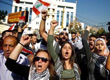 People protest against what they called 'America’s intervention in Lebanon’s affairs,' near the US embassy outside Beirut yesterday. AP