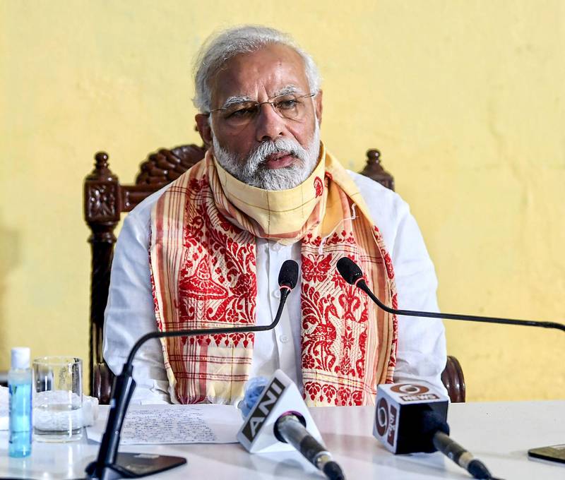 In this handout photograph taken on May 22, 2020 and released by the Indian Press Information Bureau (PIB), India's Prime Minister Narendra Modi speaks during a review meeting with officials after his aerial survey of affected areas in the state from cyclone Amphan, in Basirhat, West Bengal. RESTRICTED TO EDITORIAL USE - MANDATORY CREDIT "AFP PHOTO / Indian Press Information Bureau" - NO MARKETING - NO ADVERTISING CAMPAIGNS - DISTRIBUTED AS A SERVICE TO CLIENTS
 / AFP / PIB / Handout / RESTRICTED TO EDITORIAL USE - MANDATORY CREDIT "AFP PHOTO / Indian Press Information Bureau" - NO MARKETING - NO ADVERTISING CAMPAIGNS - DISTRIBUTED AS A SERVICE TO CLIENTS
