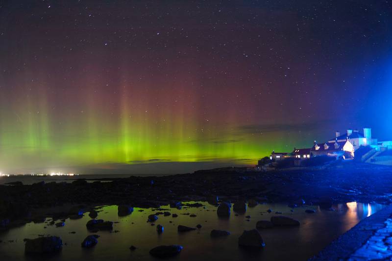 Early on Monday morning the aurora borealis, better known as the northern lights, appeared over St Mary's Island in Whitley Bay, North Tyneside. PA
