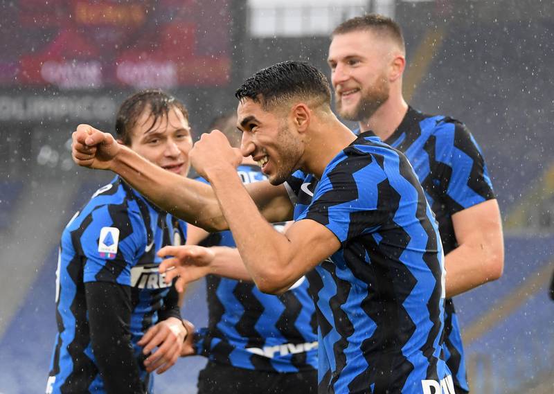 Inter Milan's Achraf Hakimi celebrates scoring their second goal. Reuters