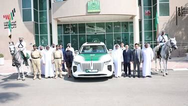 An image that illustrates this article Dubai Police add first electric vehicle to supercar fleet