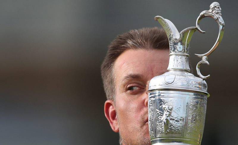 Henrik Stenson of Sweden kisses the trophy after winning the British Open Golf Championships at the Royal Troon Golf Club in Troon, Scotland, Sunday, July 17, 2016. Peter Morrison / AP Photo