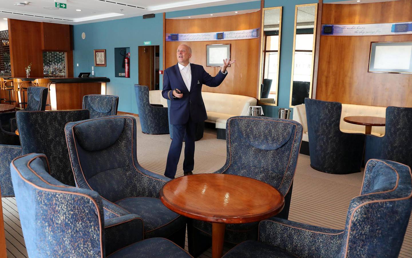 DUBAI , UNITED ARAB EMIRATES ,  October 15 , 2018 :- Peter Warwick, ex cruise director of the QE2 talking about some of his old memories inside The Chart Room at the Queen Elizabeth 2 ship in Dubai. ( Pawan Singh / The National )  For Weekend. Story by Hala Khalaf
