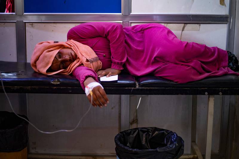 A woman suffering from cholera receives treatment at the Al Kasrah hospital in Syria's eastern province of Deir Ezzor. AFP