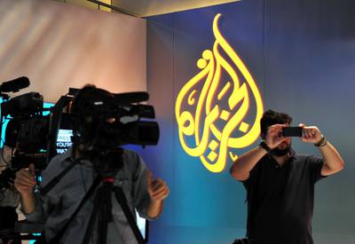 Journalists get a tour of the new Al Jazeera America studio on West 34th Street August 16, 2013 in New York. Al Jazeera America, which will launch on August 20, will have its headquarters in New York. AFP PHOTO/Stan HONDA / AFP PHOTO / STAN HONDA