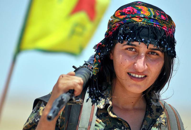 A female fighter from the Kurdish People Protection Unit (YPG) in the Syrian town of Ain Issi. Delil Souleiman / AFP