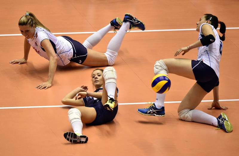 Italian players fail to reach the ball during their match of the 2016 Women’s Olympic Qualification Tournament in Tokyo, Japan The Netherlands won the match. Franck Robichon / EPA