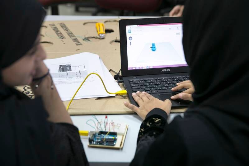 ABU DHABI, UNITED ARAB EMIRATES, Dec. 30, 2014:  
Students from Abu Dhabi high schools work in a 3D printing workshop during Tech Quest, a Higher Colleges of Technology program, on Tuesday, Dec. 30, 2015, at the Higher Colleges of Technology Men's College in Abu Dhabi. The program, which celebrates its 15th edition, attracts Emirati students for hands-on workshops and talks with industry speakers that aim to motivate the students to pursue science, technology, engineering and math (STEM) education.(Silvia Razgova / The National)  /  Usage:  Dec. 30  /  Section: AL   /  Reporter:  Roberta Pennington *** Local Caption ***  SR-141230-techquest06.jpg