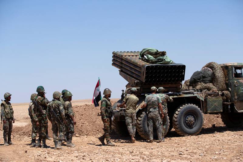 Syrian troops outside Kobani, in the country's north, where ISIS has a presence. Reuters