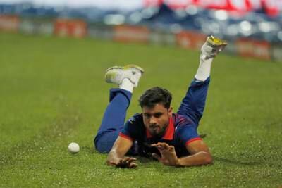 Gulshan Jha of Nepal saves a boundary during the Asia Cup Group A match against India. Getty