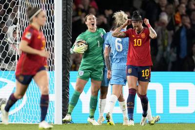 England's goalkeeper Mary Earps reacts after saving a penalty from Spain's Jennifer Hermoso. AP 
