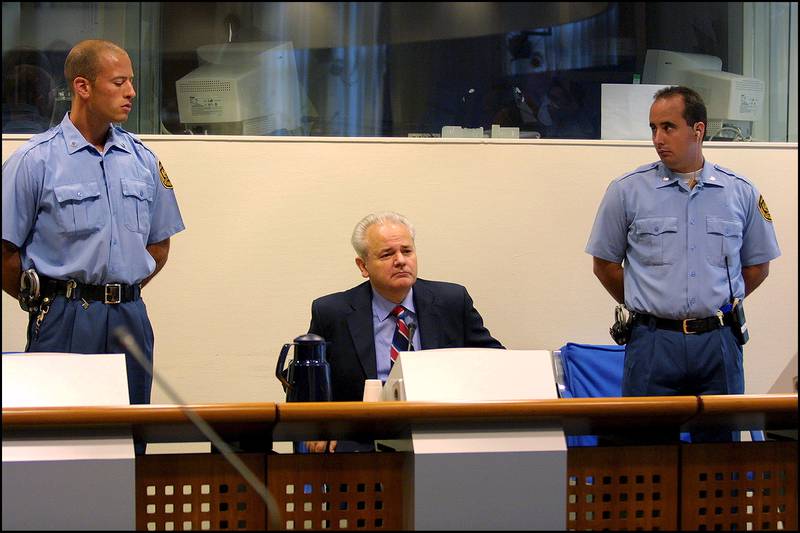 Slobodan Milosevic appears for the second time before the Yugoslav war crimes tribunal in August 2001 in The Hague. Getty Images